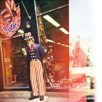 Picture of Uncle Sam figure in front of a business