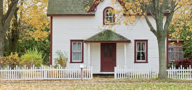 white house under maple trees by Scott Webb courtesy of Unsplash.