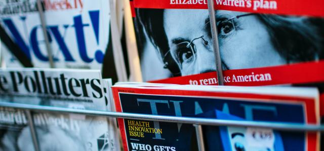 magazines displayed on a rack by Markus Spiske courtesy of Unsplash.