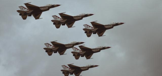 six fighter jets by UX Gun courtesy of Unsplash.